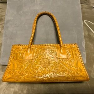 Alejandro Yeo hand tooled yellow bag